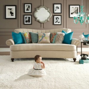 Cute baby on soft carpet | Homespun Furniture | Riverview, MI