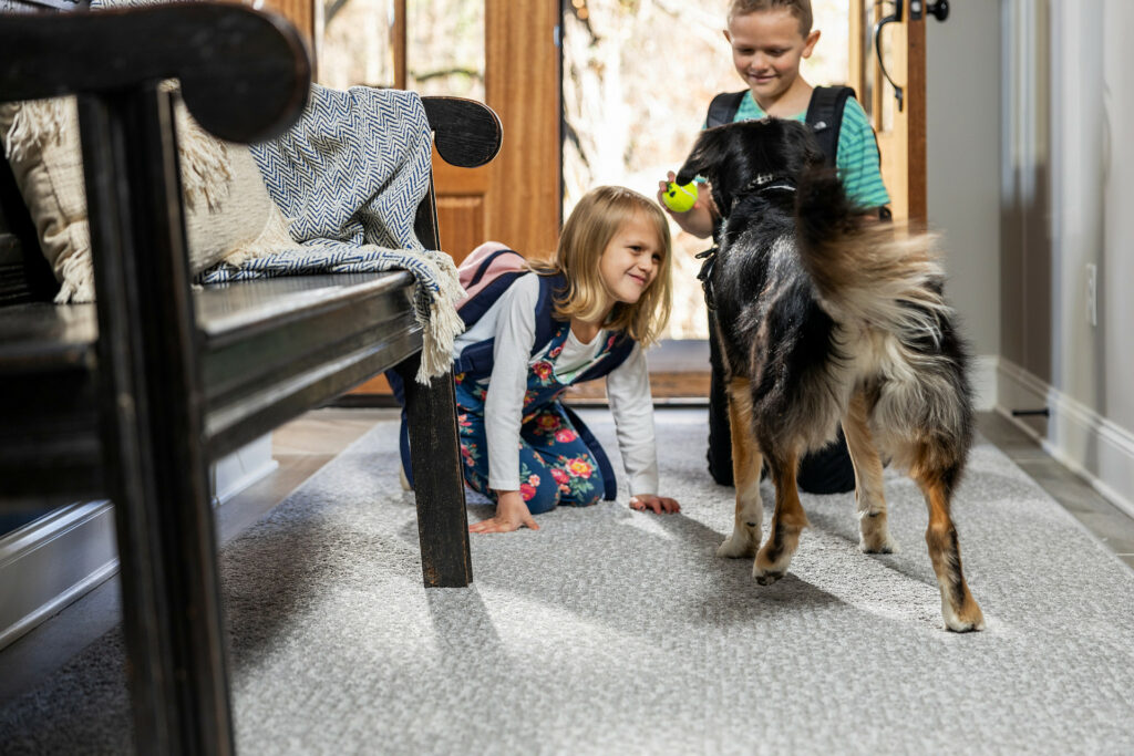 Kids playing with dog | Homespun Furniture