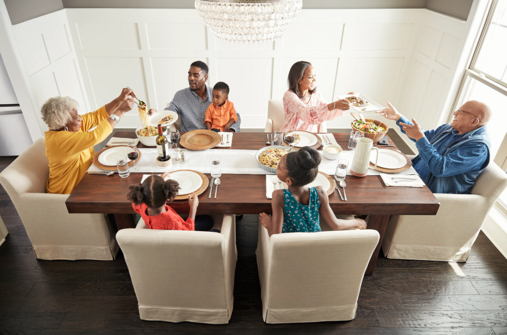 Family enjoying meal | Homespun Furniture