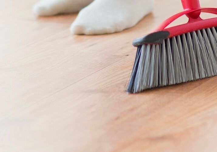 sweeping laminate flooring | Homespun Furniture | Riverview, MI
